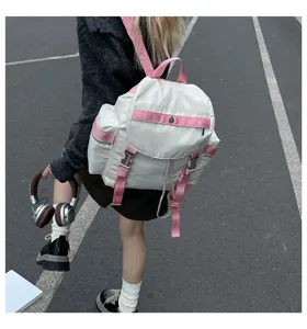 Sac à dos imperméable pour hommes et femmes, cartable décontracté avec sangles roses.