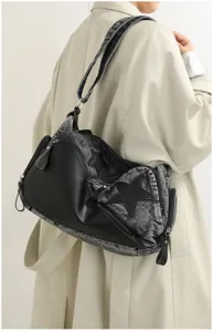 Stylish washed denim shoulder bag for women, featuring chic star patchwork and versatile design.