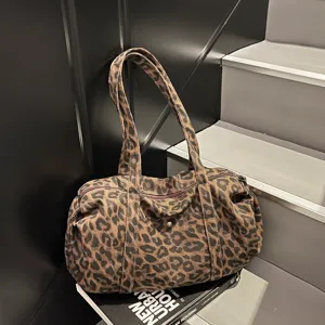 Retro leopard print canvas shoulder bag, casual large capacity duffel bag for women main view.