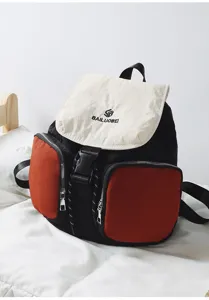 Casual large capacity backpack for women and students with multi pockets and stylish design detail.