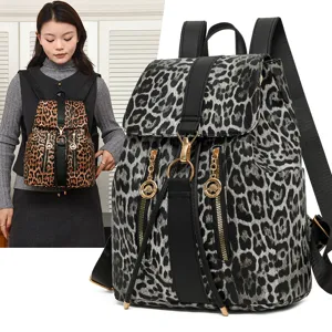 Stylish women's leopard print backpack with large capacity, durable straps and chic metal zippers.