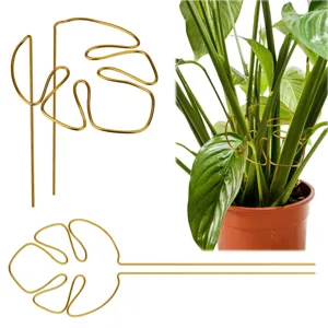 Gold monstera leaf metal plant support stake for indoor potted plants and garden decor.