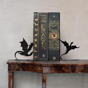 Decorative metal dragon bookends for desktop bookshelf and creative home office decor.