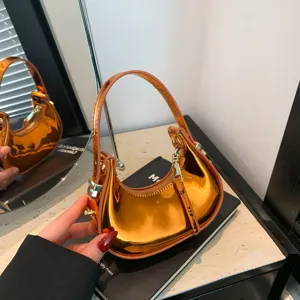 Borsa a mano a mezzaluna arancione lucida, borsa a spalla metallica da donna dettaglio