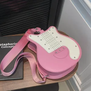 Chic guitar shaped crossbody bag for women, stylish pink and white color block design.