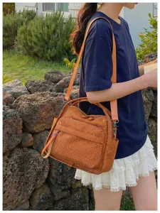 Oxford cloth shoulder bag, casual multi-pocket crossbody tote for daily use and travel.