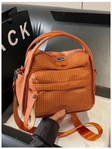 Orange plaid waterproof oxford cloth handbag, large capacity casual shoulder bag.