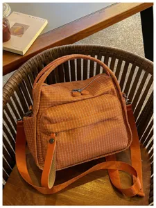 Orange grid waterproof oxford cloth shoulder bag casual large capacity tote crossbody bag.