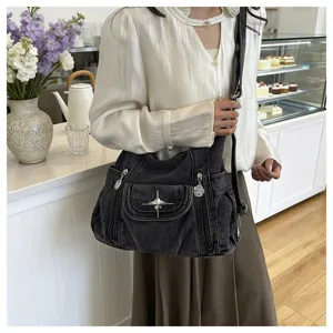 Trendy Y2K vintage denim shoulder bag with metal star charm and multiple pockets for daily wear.