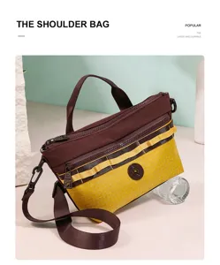 Stylish women's grid shoulder bag, lightweight sports cloth crossbody bag with multiple zip pockets.