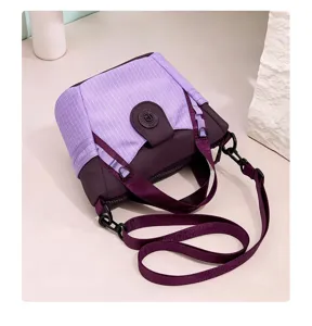Lightweight nylon crossbody shoulder bag for women, stylish purple grid commuter handbag.