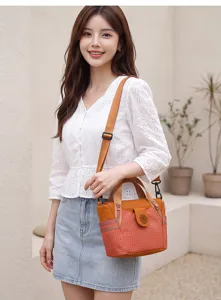 Trendy orange nylon shoulder bag for women, lightweight casual crossbody tote for daily commuting.