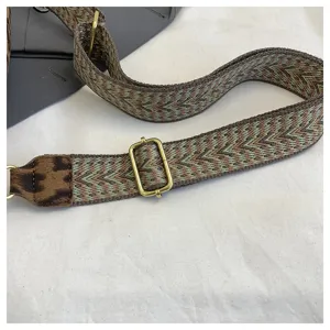 Adjustable replacement shoulder bag strap with geometric chevron and leopard print accent.