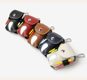 Detail shot showing colorful genuine leather golf ball pouches with tees, portable waist hanging design.
