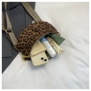 Fashionable leopard print crossbody bag with wide strap, trendy chest bag for daily wear.