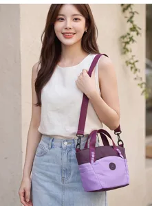 Women's purple grid pattern stylish lightweight shoulder handbag with top handle and crossbody strap.