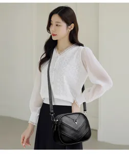 Detailed view of the stylish women's black leather shoulder crossbody underarm bag.