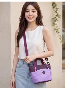 Stylish purple grid crossbody bag for women, perfect for daily commuting and travel use.