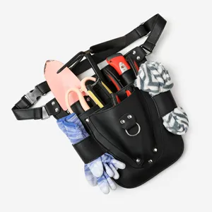 Bolso de cintura multifuncional de cuero negro para herramientas de jardinería con bolsillos.