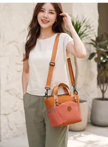 Detailed view of a stylish plaid casual shoulder bag with adjustable strap for women commute.