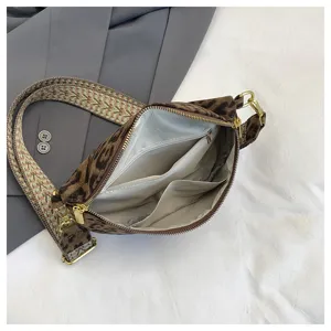 Leopard print crossbody bag with wide patterned strap and zipper closure for women daily use.
