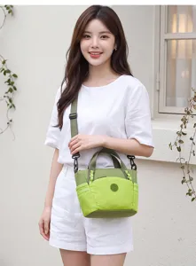 Green plaid casual crossbody bag for women, lightweight travel shoulder bag details.