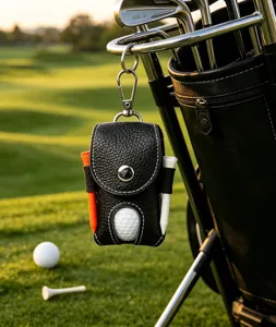 Black genuine leather golf ball pouch with tee holders, metal snap closure and belt clip.