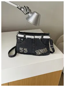 Elegante borsa a tracolla in denim nero con design a gonna, cintura glitter e ricami.