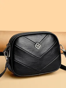 Black PU leather crossbody bag for women, chic chevron quilted shoulder bag with metal lock.