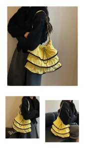 Sac à bandoulière en toile jaune à volants et bordure noire, grand sac seau pour femmes.