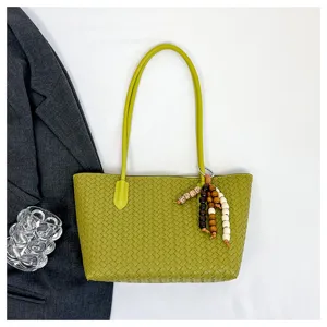 Green woven leather tote bag shoulder handbag commuter handbag detailed view daily style