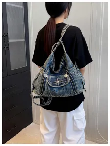 Y2K denim hobo shoulder bag for women, versatile motorcycle style tote with cool star decor.