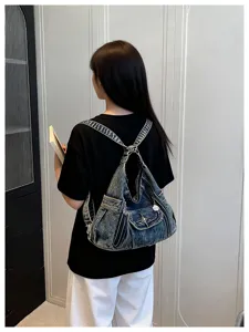 Y2K denim motorcycle backpack and versatile crossbody tote bag for women chic style detail