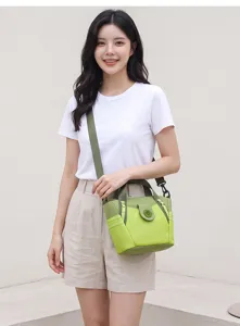 Stylish casual nylon crossbody shoulder bag for women, lightweight commuter handbag with large capacity.