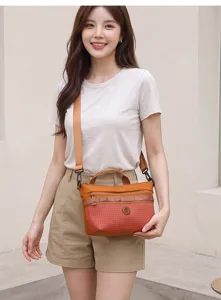 Stylish casual crossbody bag for women, lightweight grid fabric shoulder bag with strap.