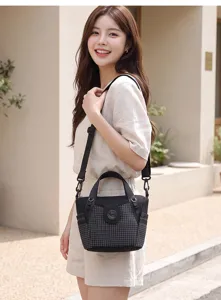 Detailed view of lightweight nylon crossbody tote bag, casual daily commuting shoulder bag.