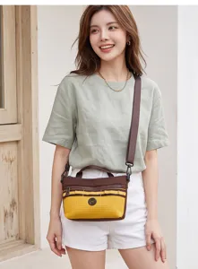 Casual plaid crossbody bag for women, lightweight fabric shoulder bag with front pocket.