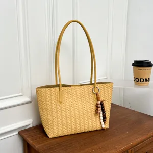 Yellow woven tote bag for women, large capacity PU leather shoulder bag for commute.