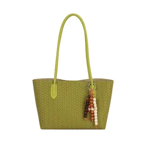 Green woven leather tote bag for women stylish shoulder bag large capacity daily commute handbag.
