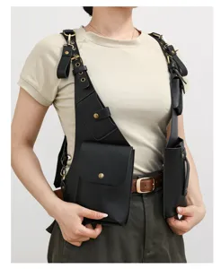 Detailed view of black PU leather tactical chest rig bag with multi pockets and buckles.