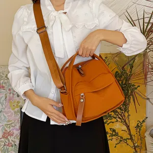 Stylish casual nylon crossbody bag with top handle and adjustable strap for women daily commute.