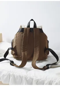 Casual brown backpack for women and students with large capacity and durable straps.