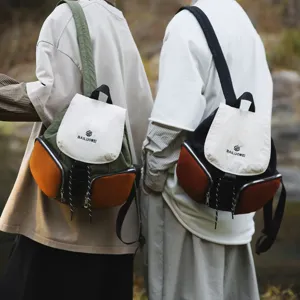 Stylish casual canvas backpack with large capacity, retro multi-pocket design for daily school use.