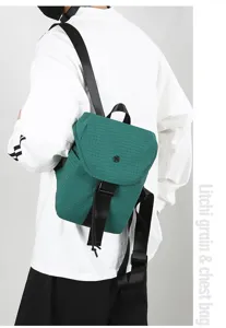 Green litchi grain small backpack detail shot, casual commuting unisex travel bag.