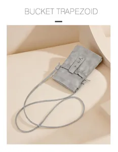 Minimalist gray crossbody phone bag with drawstring flap and metal heart clasp for daily use.