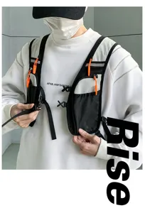 Detailed view of tactical chest vest bag, functional outdoor running backpack with orange pulls.