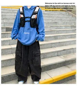 Outdoor tactical vest detail shot, showcasing multi-pocket functional design and urban style.