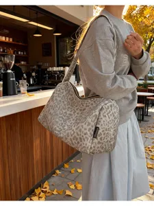 Stylish grey leopard print canvas shoulder bag, large capacity underarm pillow bag.