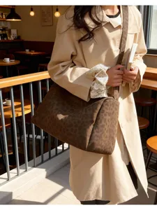 Chic leopard print canvas shoulder bag large capacity casual tote bag for women daily use.