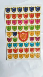 Details of colorful shield reward stickers for kids, perfect for school evaluation and motivation.